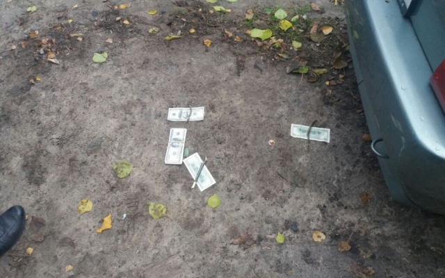 В Запорожье задержали офицера с долларовой взяткой (ФОТО) Фото № 1 В Запорожье задержали офицера с долларовой взяткой (ФОТО) Фото № 1