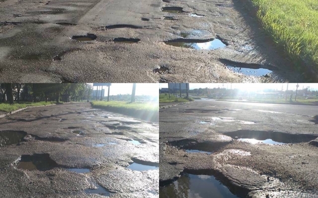 Жители Хортицкого района жалуются на разбитую дорогу во дворе Фото № 1 Жители Хортицкого района жалуются на разбитую дорогу во дворе Фото № 1