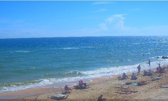 Пляжи запорожских курортов снова заполнили отдыхающие (ФОТО)